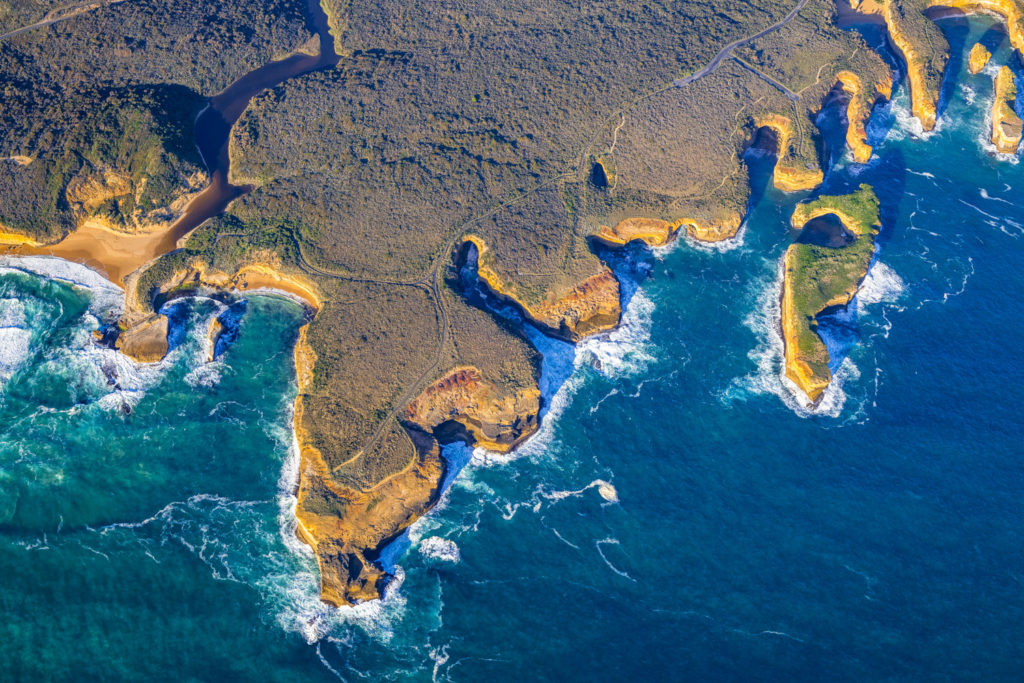 Aerial view of Muttonbird Island and twelve apostles coastline a